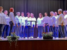 JungerChor TakeFour beim Tag des Liedes 2025, a group of people on a stage