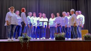JungerChor TakeFour beim Tag des Liedes 2025, a group of people on a stage